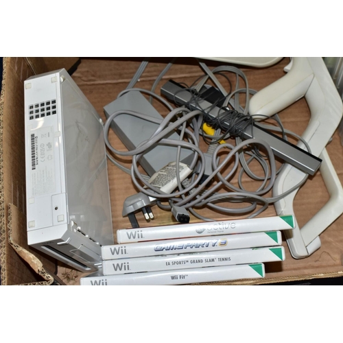 452 - A BOX OF GAMING ITEMS, to include Wii console and Wii fit  board and game, various other games (acti... 