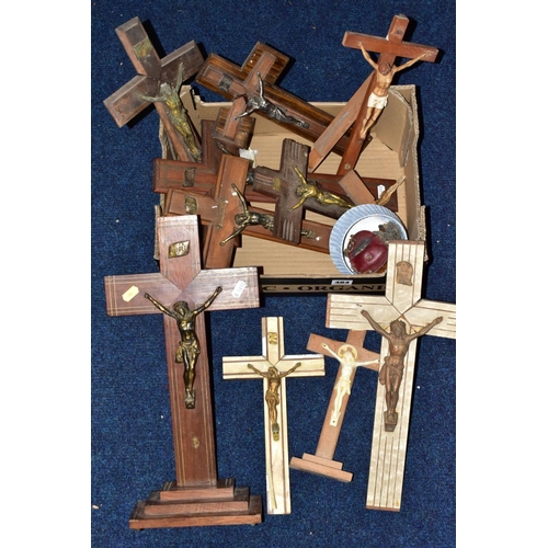 484 - A BOX OF WOODEN CRUCIFIXES, together with rosary beads and religious medallions