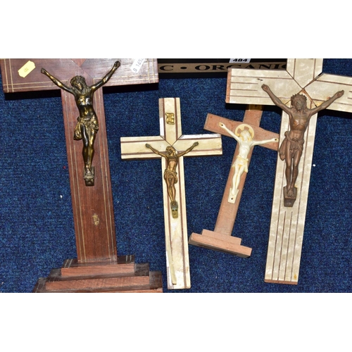 484 - A BOX OF WOODEN CRUCIFIXES, together with rosary beads and religious medallions