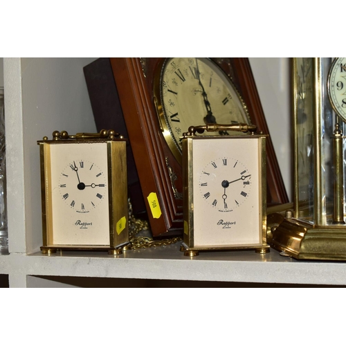 508 - SIX CLOCKS COMPRISING A GERMAN ANNUAL ANNIVERSARY CLOCK, two Rapport of London carriage clocks, cuck... 