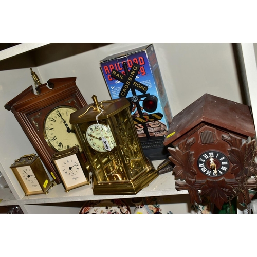 508 - SIX CLOCKS COMPRISING A GERMAN ANNUAL ANNIVERSARY CLOCK, two Rapport of London carriage clocks, cuck... 