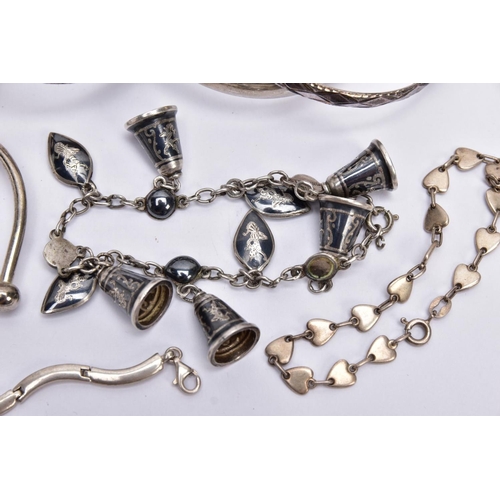 53 - A BAG OF ASSORTED SILVER AND WHITE METAL BRACELETS, to include a silver hinged bangle with a decorat... 