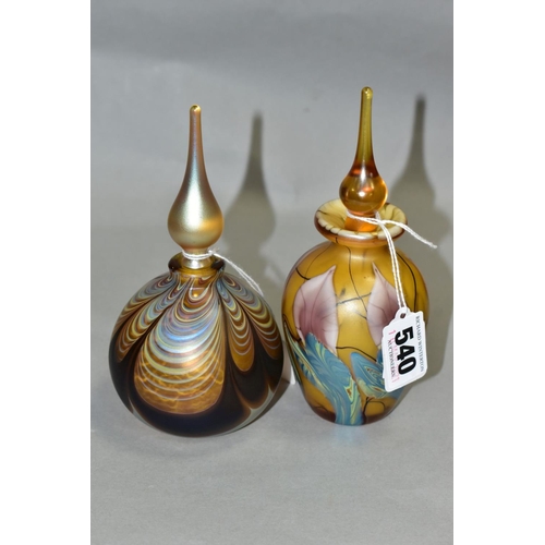 540 - TWO IRIDESCENT PERFUME BOTTLES AND STOPPERS, one of baluster form, height 16cm, the other of bulbous... 