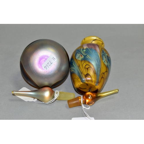 540 - TWO IRIDESCENT PERFUME BOTTLES AND STOPPERS, one of baluster form, height 16cm, the other of bulbous... 