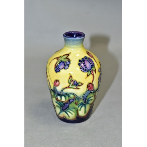 541 - A SMALL MOORCROFT POTTERY BUD VASE 'Hepatica' pattern, by Emma Bossons, impressed backstamp and gilt... 