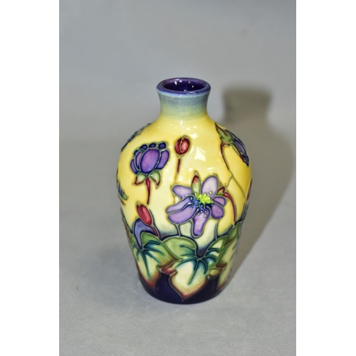 541 - A SMALL MOORCROFT POTTERY BUD VASE 'Hepatica' pattern, by Emma Bossons, impressed backstamp and gilt... 