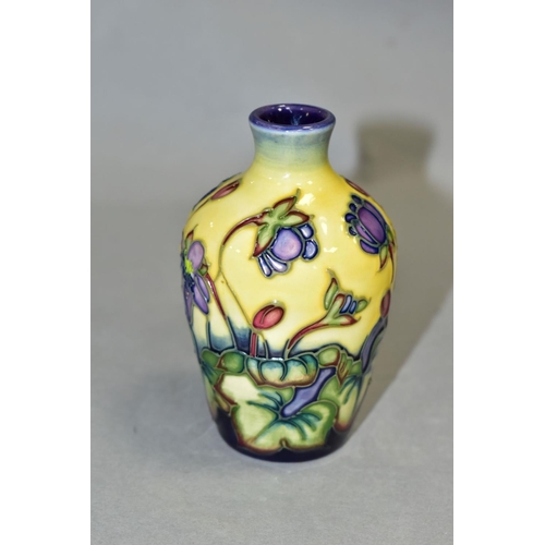 541 - A SMALL MOORCROFT POTTERY BUD VASE 'Hepatica' pattern, by Emma Bossons, impressed backstamp and gilt... 