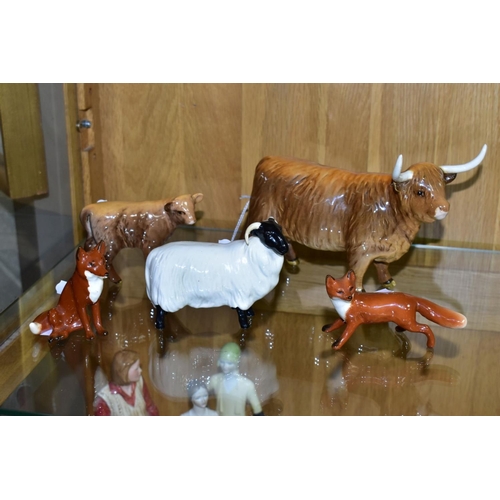 549 - TWO BESWICK HIGHLAND CATTLE, a Cow No 1740 and a Calf No 1827D, both gloss, together with a Black Fa... 