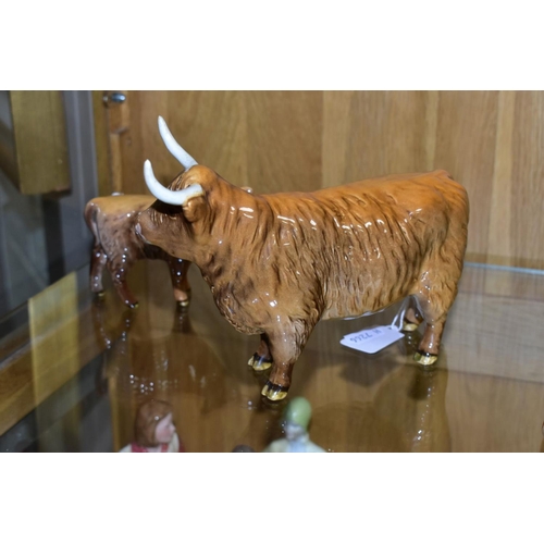 549 - TWO BESWICK HIGHLAND CATTLE, a Cow No 1740 and a Calf No 1827D, both gloss, together with a Black Fa... 