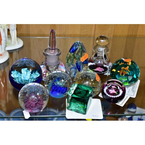 555 - A GROUP OF GLASS SCENT BOTTLES AND PAPERWEIGHTS, to include Caithness 'Fuchsia' perfume bottle, heig... 