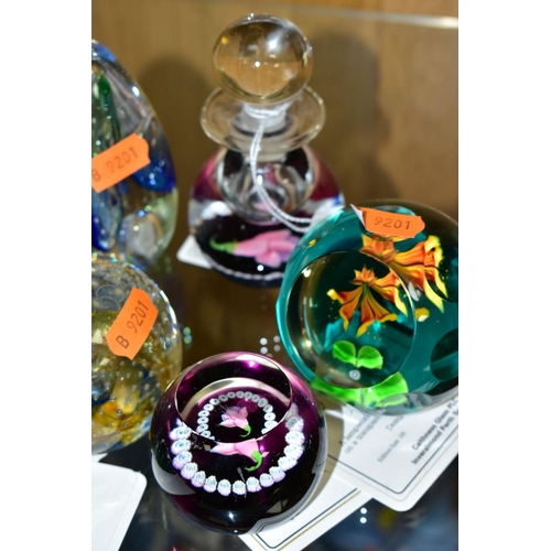 555 - A GROUP OF GLASS SCENT BOTTLES AND PAPERWEIGHTS, to include Caithness 'Fuchsia' perfume bottle, heig... 