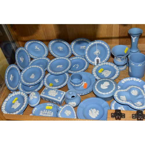 560 - WEDGWOOD BLUE JASPERWARE TRINKETS AND VASES, etc, to include a set of twelve dishes from Zodiac sign... 