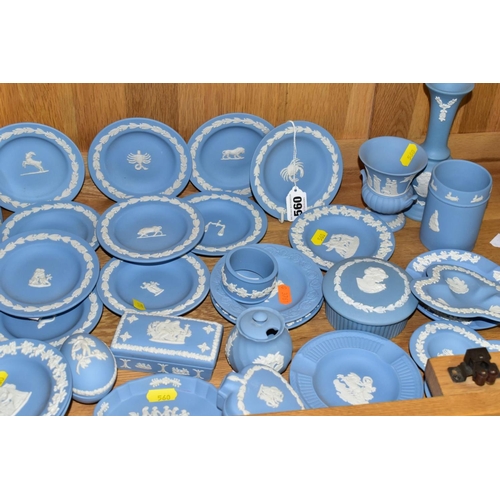 560 - WEDGWOOD BLUE JASPERWARE TRINKETS AND VASES, etc, to include a set of twelve dishes from Zodiac sign... 