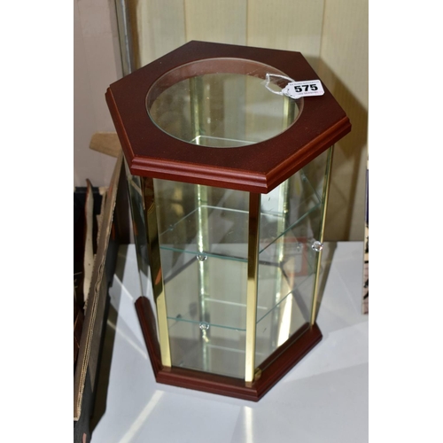 575 - A MODERN HEXAGONAL TABLE TOP DISPLAY CASE, the wooden top with circular glazed panel above six glaze... 