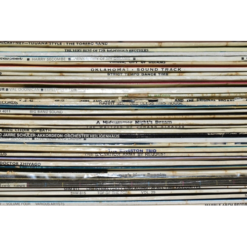 580 - TWO TRAYS CONTAINING OVER ONE HUNDRED AND THIRTY LPs AND 78s including Abba, Paul Robeson, The Beach... 