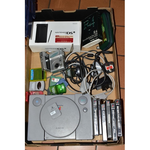 582 - A BOXED NINTENDO DSI, SONY PLAYSTATION etc, including six Playstation games comprising 'Knockout Kin... 