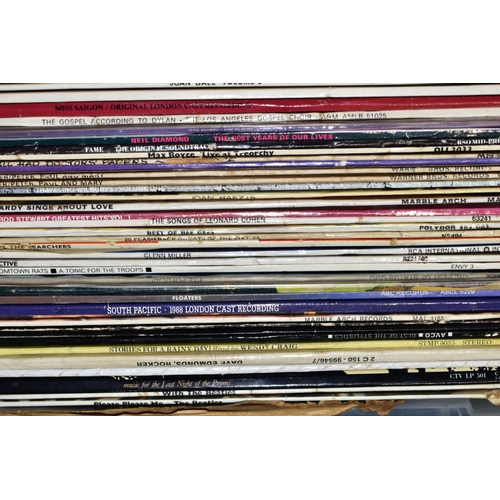 583 - A PLASTIC BOX CONTAINING OVER ONE HUNDRED LPs, 12IN AND 7IN SINGLES including Rubber Soul (poor), Wi... 