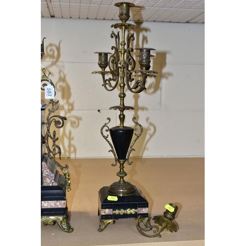 587 - A LATE 19TH CENTURY BLACK SLATE, MARBLE AND GILT METAL CLOCK GARNITURE, the clock with urn shaped su... 