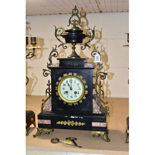 587 - A LATE 19TH CENTURY BLACK SLATE, MARBLE AND GILT METAL CLOCK GARNITURE, the clock with urn shaped su... 