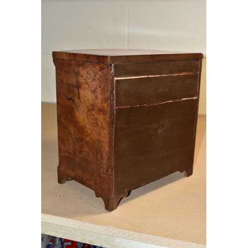 588 - A VICTORIAN BURR WALNUT VENEERED MINIATURE BOW FRONT CHEST OF THREE DRAWERS, turned wooden handles, ... 