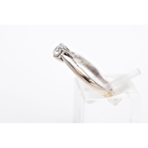 6 - AN 18CT WHITE GOLD DIAMOND RING, designed with a central claw set, round brilliant cut diamond, tape... 