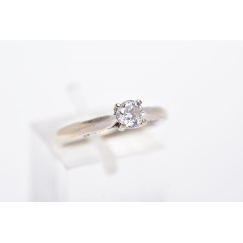 6 - AN 18CT WHITE GOLD DIAMOND RING, designed with a central claw set, round brilliant cut diamond, tape... 