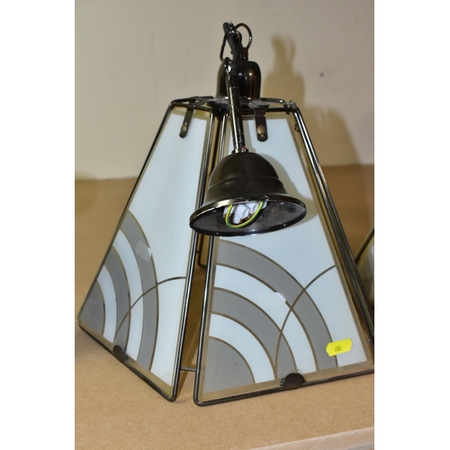 606 - CEILING LIGHTS AND TABLE LAMP comprising a pair of pyramid shaped lamps with glass panels, approxima... 