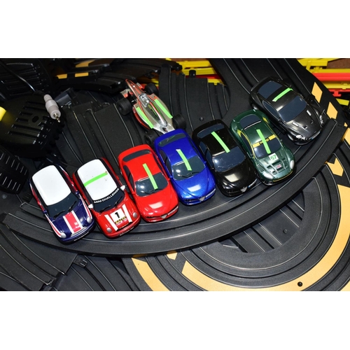 613 - A QUANTITY OF UNBOXED AND ASSORTED HORNBY MICRO SCALEXTRIC, to include assorted cars, track, control... 