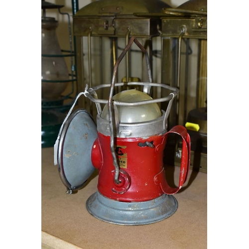 622 - TWO PARAFFIN/OIL STORM LANTERNS, both use 1 inch wicks, approximate height 39cm, together with a vin... 