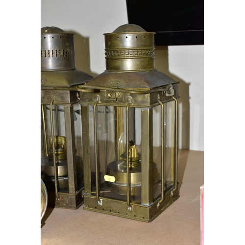 622 - TWO PARAFFIN/OIL STORM LANTERNS, both use 1 inch wicks, approximate height 39cm, together with a vin... 