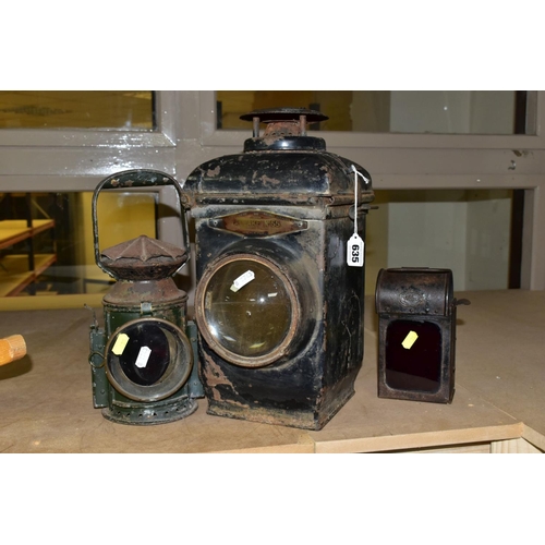 635 - AN ADLAKE NO. 55 RAILWAY LAMP, black painted body with clear bulls eye lens, complete with lift out ... 