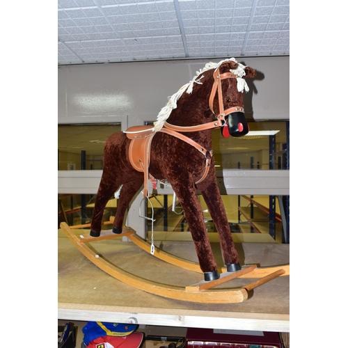 636 - A MODERN WOODEN ROCKING HORSE, covered in brown plush with string tail and mane, painted mouth, nose... 