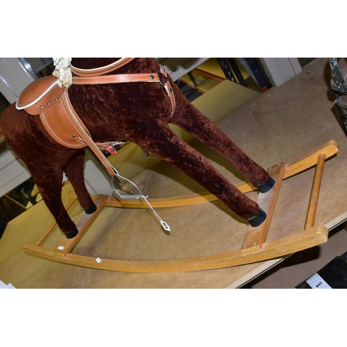 636 - A MODERN WOODEN ROCKING HORSE, covered in brown plush with string tail and mane, painted mouth, nose... 