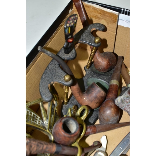 644 - A SMALL BOX OF SUNDRIES, to include various pipes (one with sterling silver collar) and stands, pen ... 