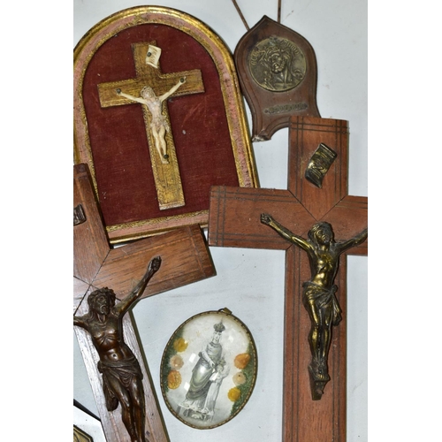 647 - A BOX OF VARIOUS CRUCIFIXES, some metal, mostly resin, mostly wall hangings, tallest height 36cm, to... 