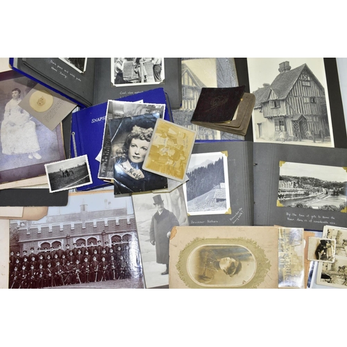 649 - PHOTOGRAPHS, a collection of Edwardian, early - mid 20th Century photographs in one box and four alb... 