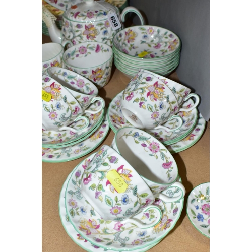 658 - A MINTON 'HADDON HALL' PATTERN PART DINNER SERVICE, ETC, comprising teapot and cover, milk jug, suga... 