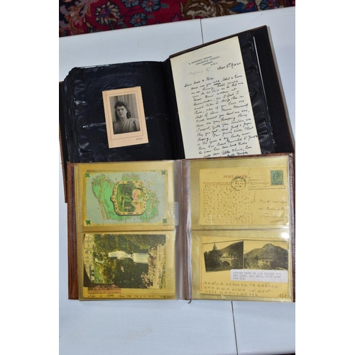 662 - EPHEMERA AND POSTAL HISTORY, three albums containing an unusual collection of Arms and Crests, monog... 