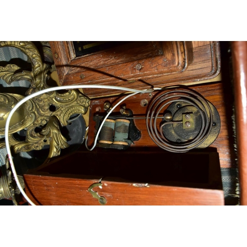 666 - A BROWN LEATHER COVERED SUITCASE OF COLLECTABLES including servants bell board, etc, and a Columbus ... 