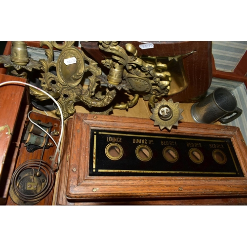 666 - A BROWN LEATHER COVERED SUITCASE OF COLLECTABLES including servants bell board, etc, and a Columbus ... 