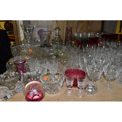 668 - A QUANTITY OF GLASSWARE, including a Waterford Crystal quartz mantel clock, height 11cm, coloured an... 