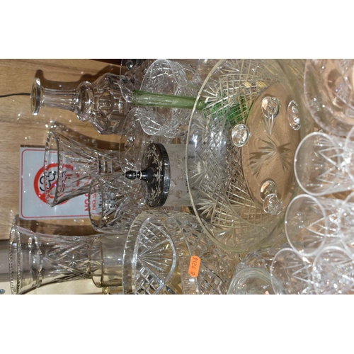 668 - A QUANTITY OF GLASSWARE, including a Waterford Crystal quartz mantel clock, height 11cm, coloured an... 