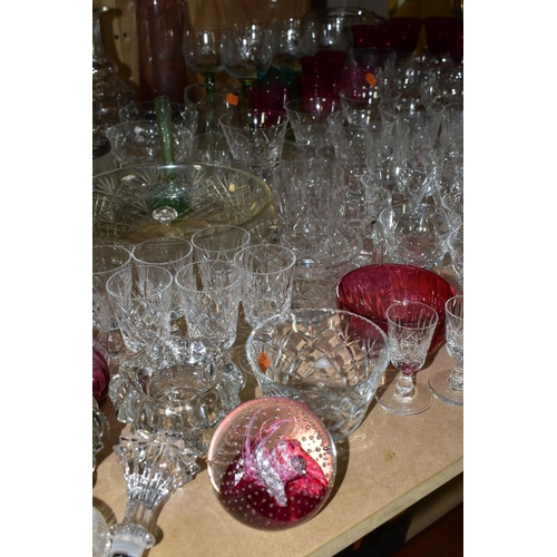 668 - A QUANTITY OF GLASSWARE, including a Waterford Crystal quartz mantel clock, height 11cm, coloured an... 