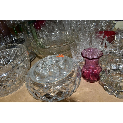 668 - A QUANTITY OF GLASSWARE, including a Waterford Crystal quartz mantel clock, height 11cm, coloured an... 