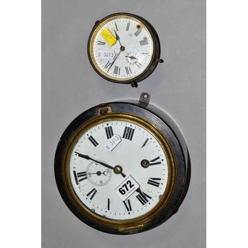 672 - A METAL CASED SHIPS STYLE CLOCK, the white enamelled dial has Roman numerals and a separate seconds ... 