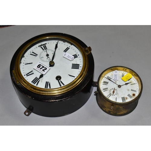 672 - A METAL CASED SHIPS STYLE CLOCK, the white enamelled dial has Roman numerals and a separate seconds ... 