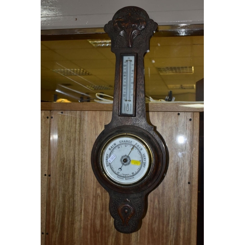 672 - A METAL CASED SHIPS STYLE CLOCK, the white enamelled dial has Roman numerals and a separate seconds ... 