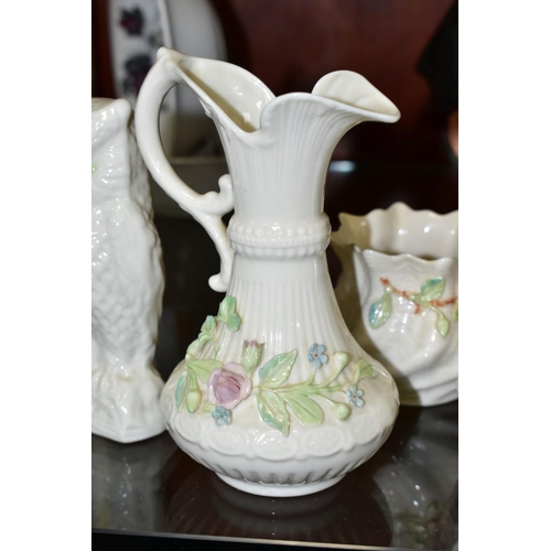 686 - BELLEEK PORCLEAIN comprising a near pair of Aberdeen pitcher shaped vases, pink rose and shamrock de... 