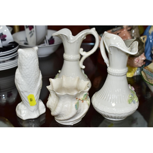 686 - BELLEEK PORCLEAIN comprising a near pair of Aberdeen pitcher shaped vases, pink rose and shamrock de... 