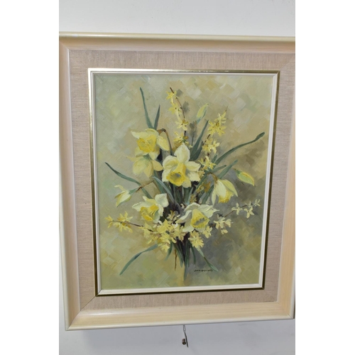 699 - JOAN HADFIELD (20TH CENTURY), two oil on canvas flower studies, the first depicts daffodils and yell... 